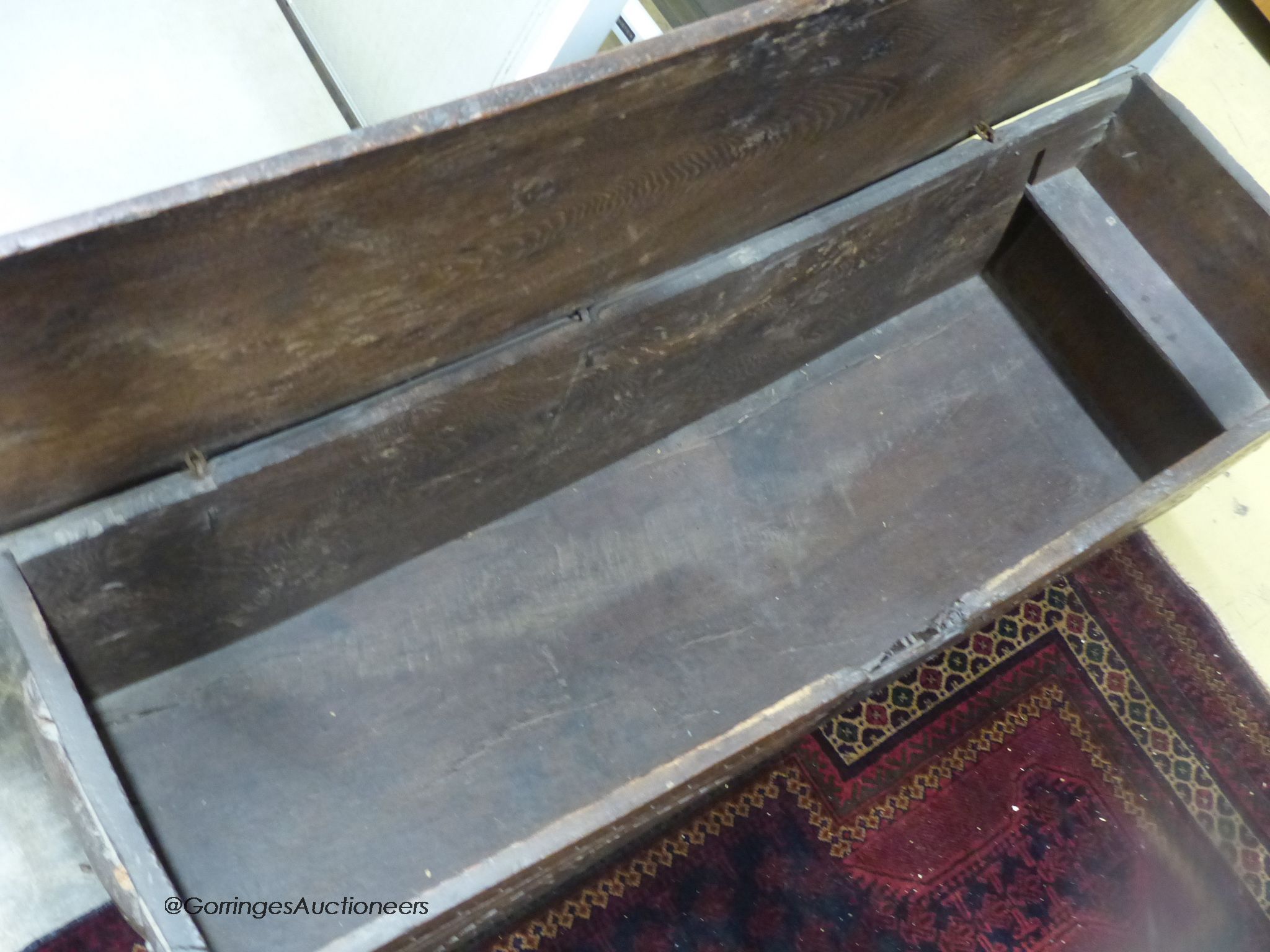 A 17th century six plank coffer, length 115cm, depth 38cm, height 54cm